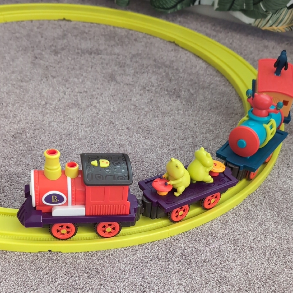 B. Toys Critter Express Musical Train & Track